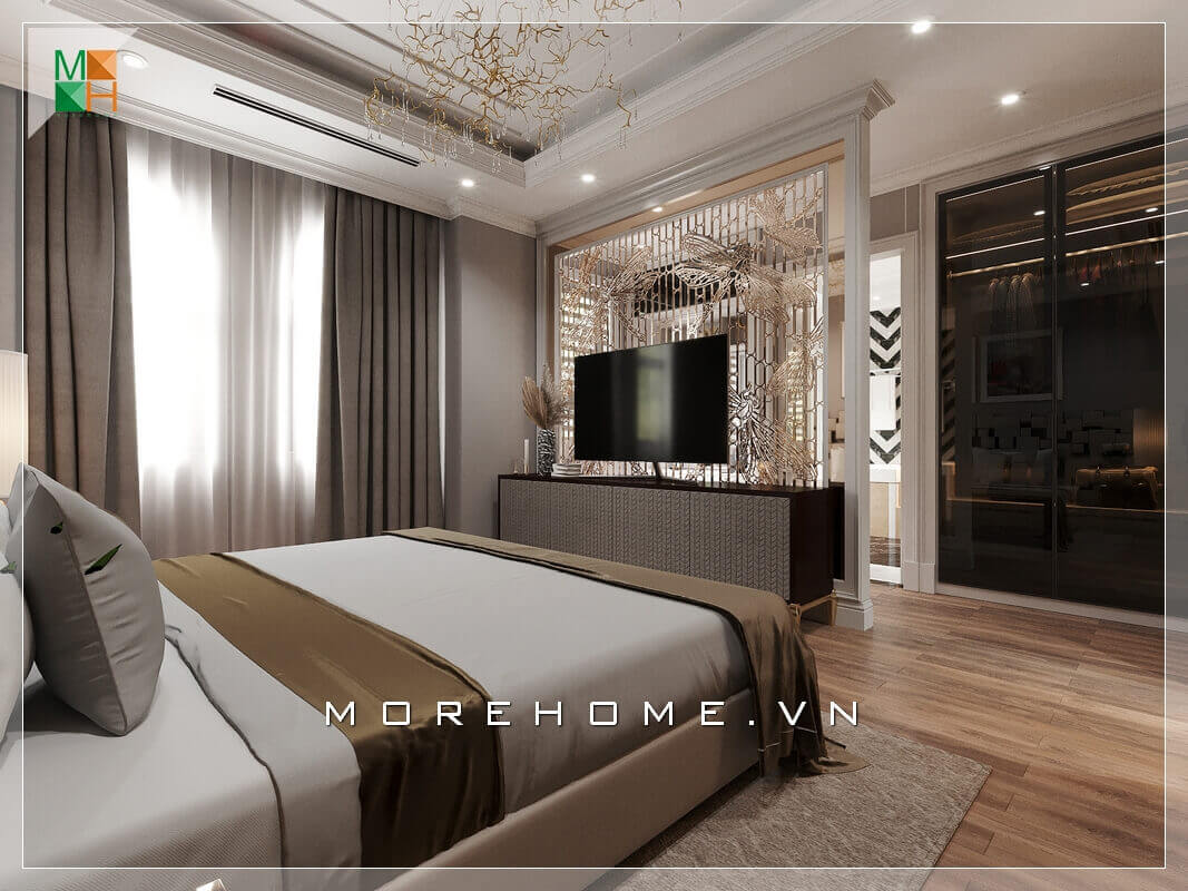 Vẻ đẹp sang trọng của mẫu phòng ngủ thể hiện ở việc lựa chọn những cái đèn sắc vàng, đèn chùm treo tường đầy sức lôi cuốn và tinh tế. Thiết kế phòng ngủ biệt thự